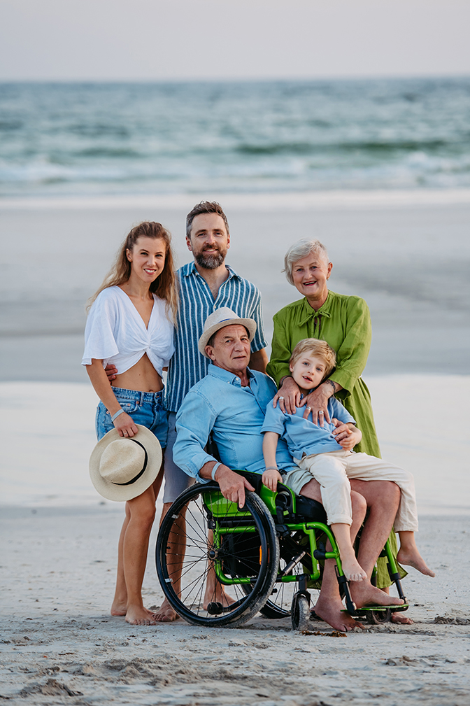 portrait of multi generations family with little kids at sea in exotic country.